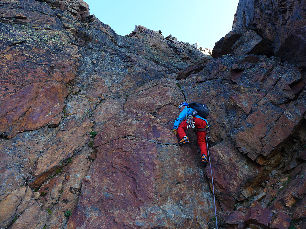 Kenny leading the final short pitch up to the ridge