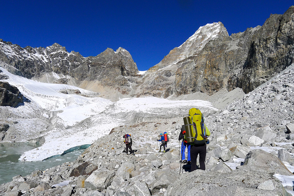 Descending down toward the glacier. I am the proud owner of the huge green rucksack! (photo taken by Mark Baron)