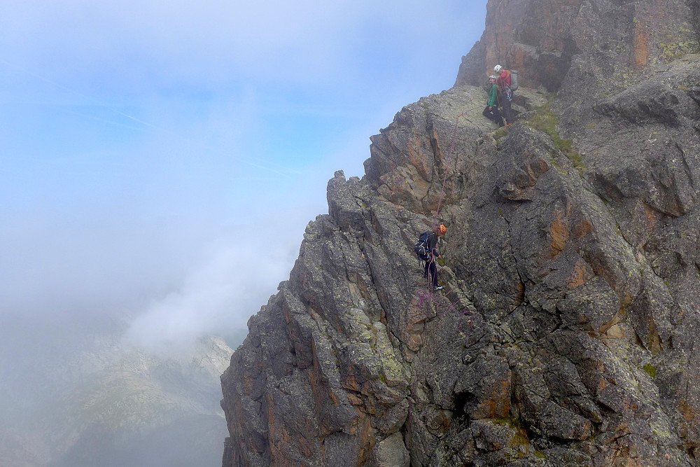 Climbers descending down to the col
