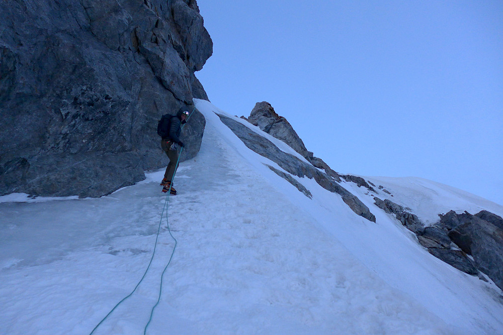 Tim descending the icy snow slopes before the Aiguille de Rochefort