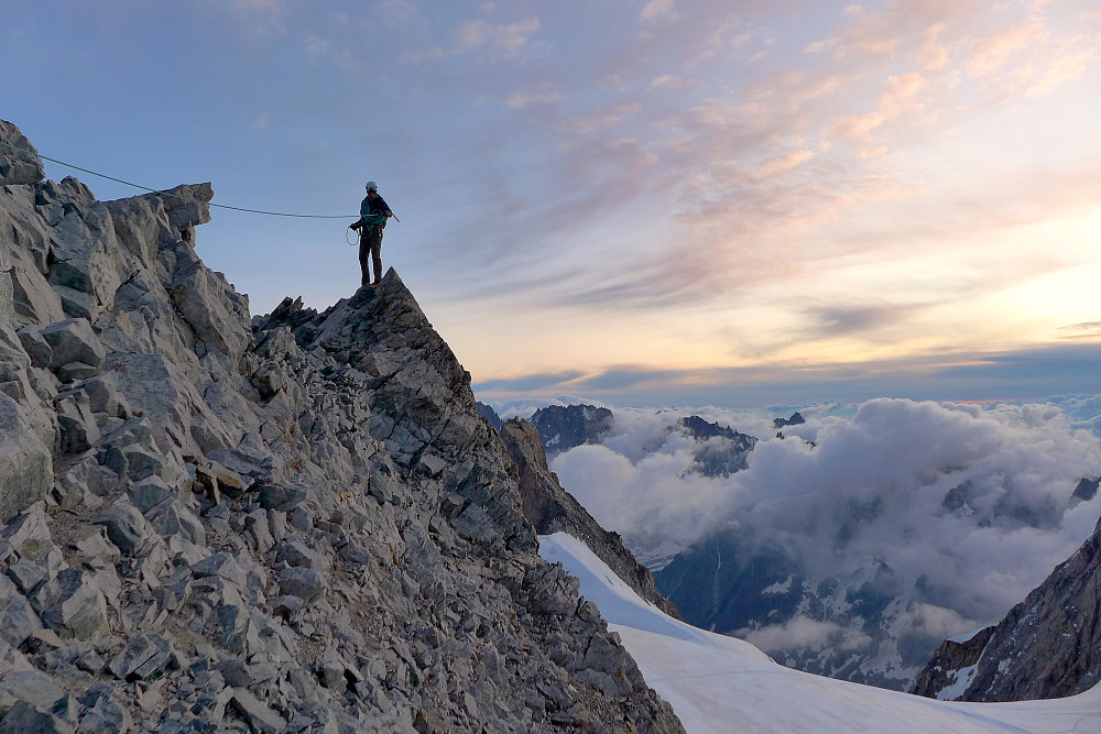 Tim at the summit of the Aiguille de Rochefort just before sunrise
