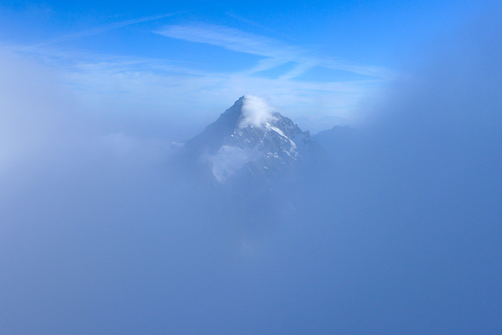 The Dent Blanche appearing from above the fog when we got to the summit
