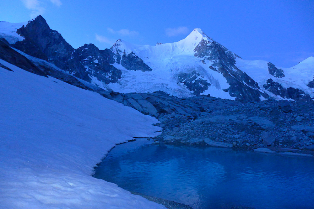 Dawn at the edge of the Glacier du Mountet with the Trifthorn (left) Ober Gabelhorn (right) on the skyline