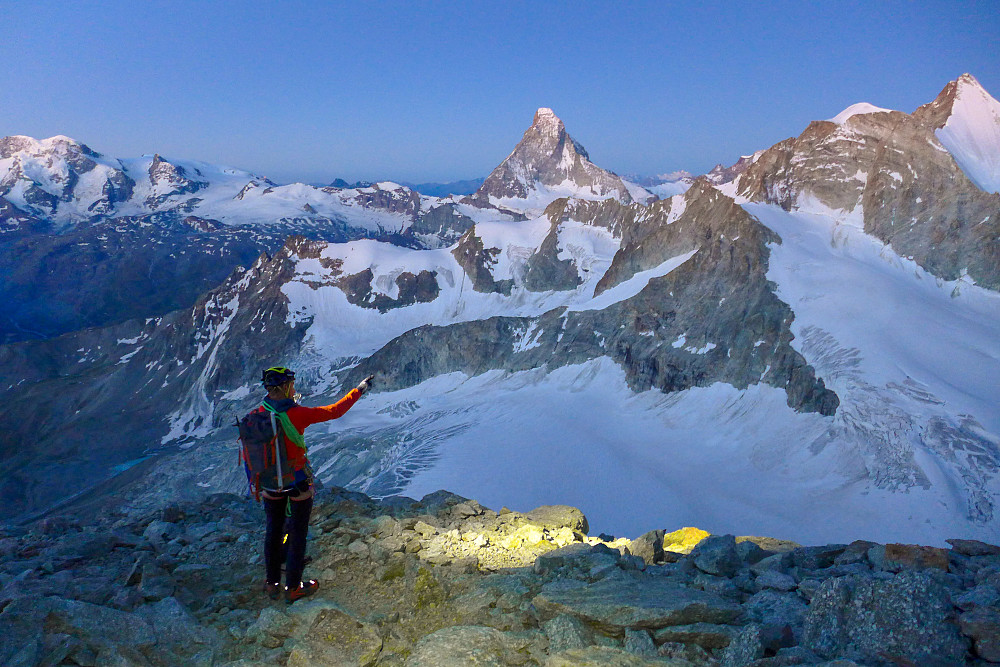Dawn at the end of the easy ground ca. 3750m. An Italian guide and his Australian client admire the views!