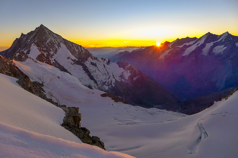 Sunrise from behind the Dirruhorn with the Weisshorn to the left