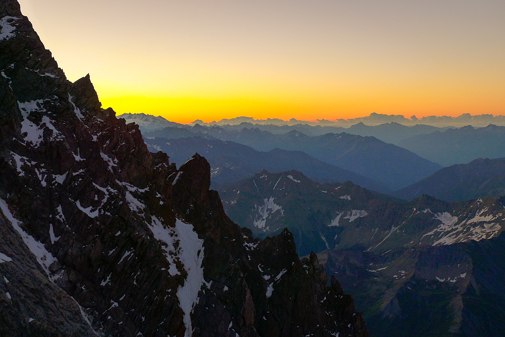 Sunrise colours behind the Tronchey Ridge of the Grandes Jorasses