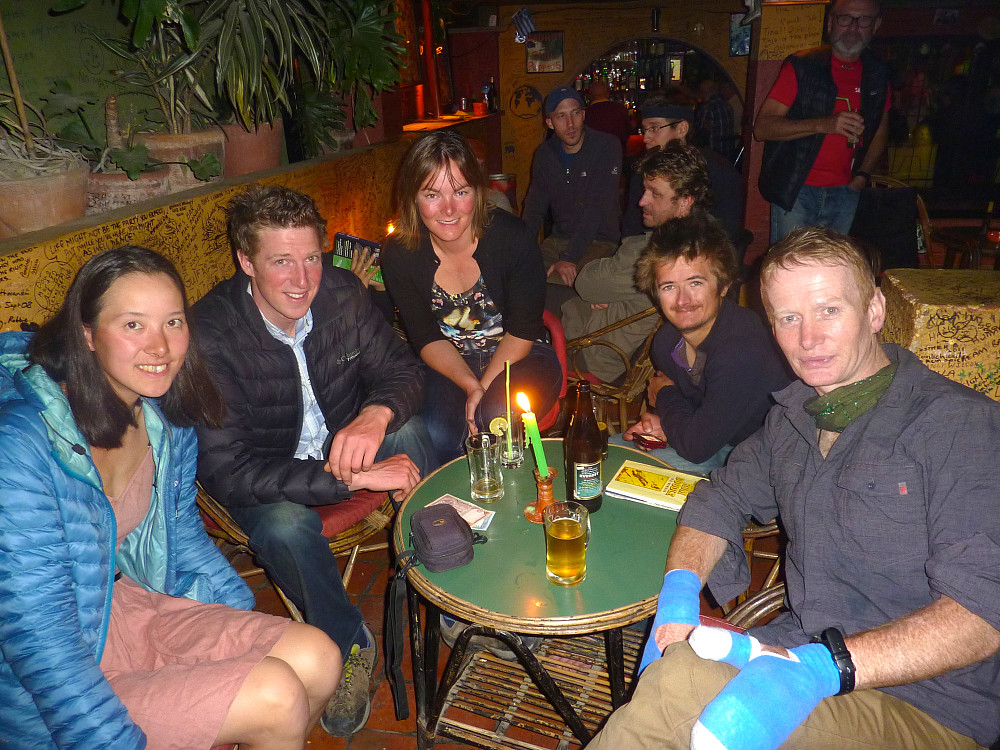 At the pub after dinner at Rum Doodle in Kathmandu. Eoin sports his special mittens after getting treated for frostbite.