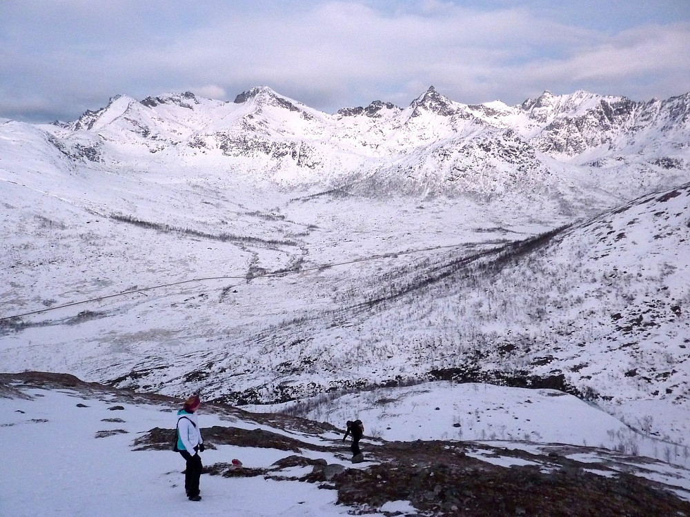 Aline and Christian on the way up Durmålstinden, with the peaks on the northern side of Kattfjord behind