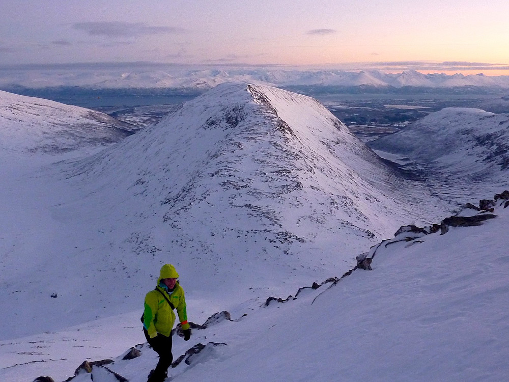 Aline on the way up, still coping without crampons. Skittenskarfjellet a.k.a the 'tent peak' in the background