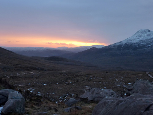Sunrise behind us as we begin the walk in toward the coire