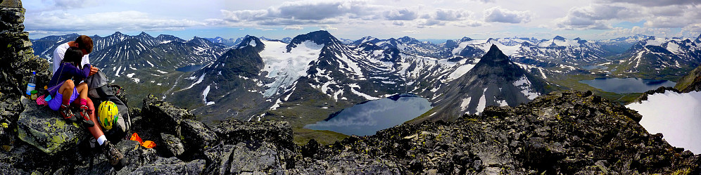 Morten and Linn Therese on the top of Tverrbytthornet. View towards Visbreatinden and Kyrkja