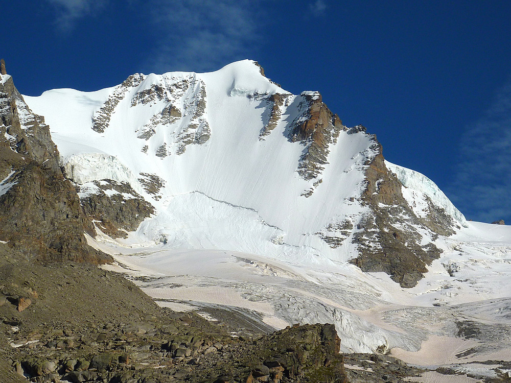 The north face of the Gran Paradiso. The route goes pretty much straight up from the glacier, over the bergschrund and follows closely the rocky rib on the left hand side of the face.