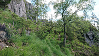 Rounding the steep cliff