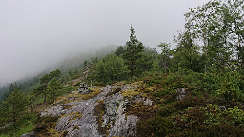The highest point at Vardane with Beitelen in the fog in the background